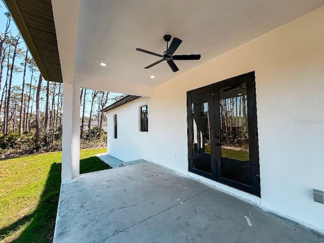 view of patio / terrace with french doors and ceiling fan