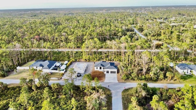 aerial view featuring a forest view