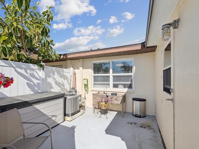 view of patio featuring central AC unit