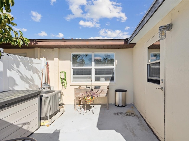 view of patio featuring central AC unit