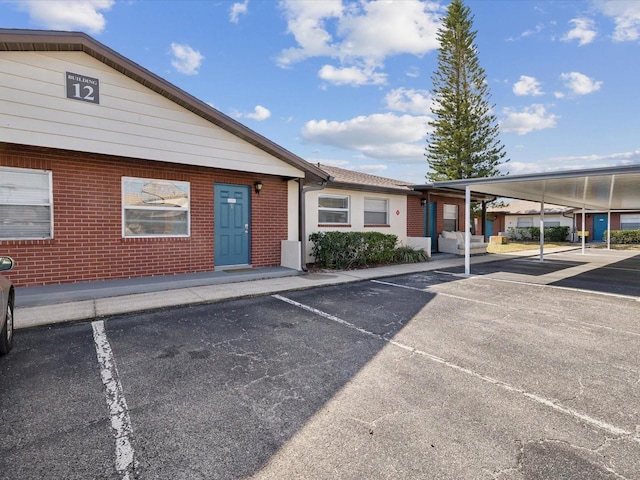 exterior space featuring a carport