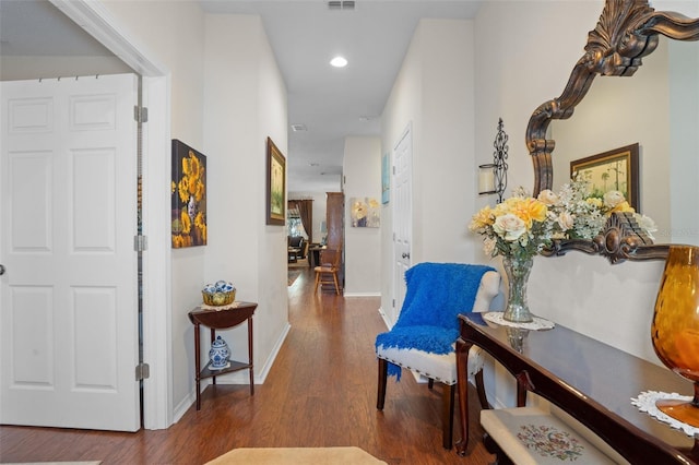 hallway with wood-type flooring