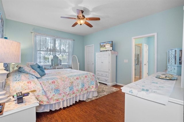 bedroom with ceiling fan and dark hardwood / wood-style flooring