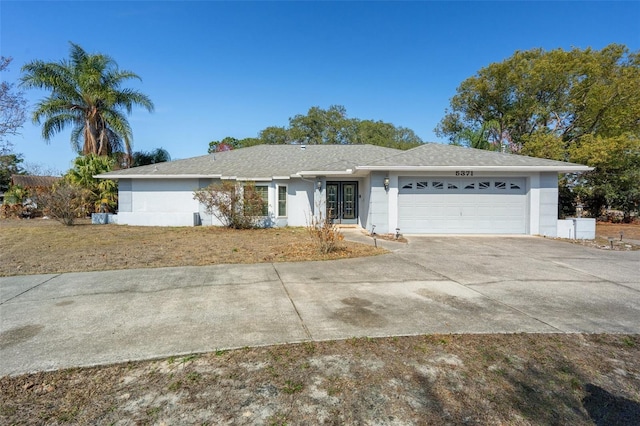 ranch-style home with a garage