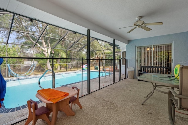 view of pool with ceiling fan