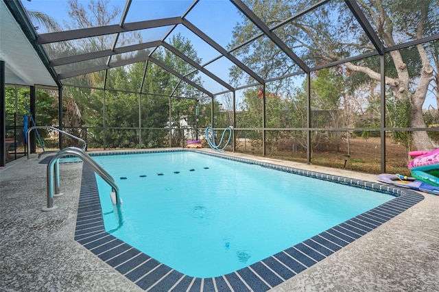 view of pool featuring a lanai