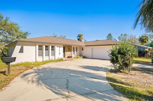 ranch-style home with a garage