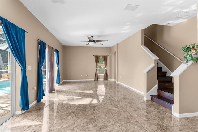 empty room featuring ceiling fan