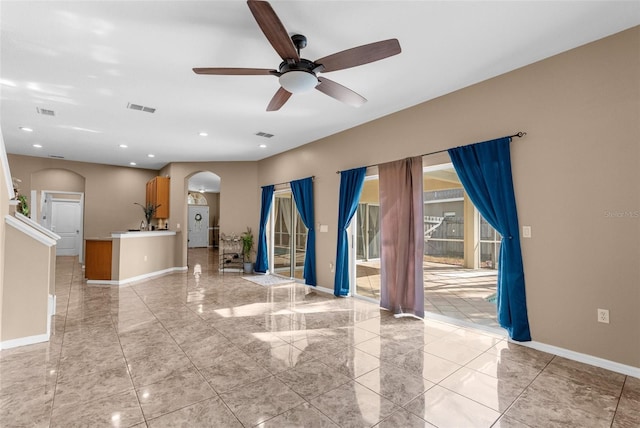 empty room featuring ceiling fan