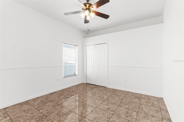 unfurnished room with ceiling fan