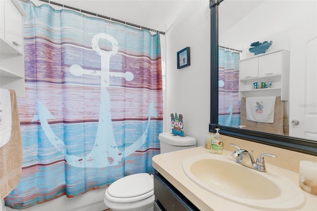 full bathroom with vanity, shower / bath combination with curtain, and toilet