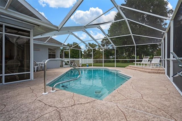 view of pool featuring a patio and a lanai