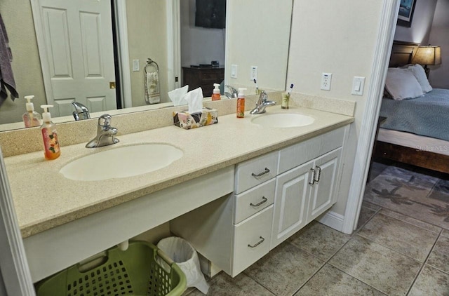 bathroom with vanity and tile patterned floors