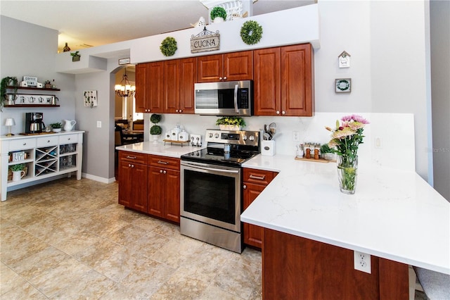 kitchen with an inviting chandelier, stainless steel appliances, and hanging light fixtures