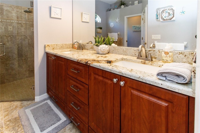 bathroom with vanity and an enclosed shower