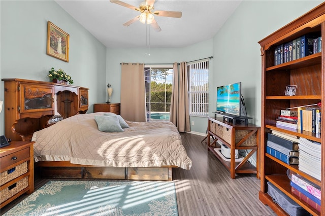 bedroom featuring hardwood / wood-style floors and ceiling fan