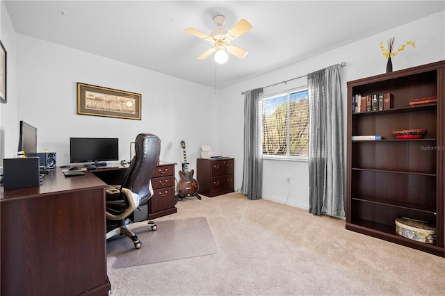 carpeted office with ceiling fan