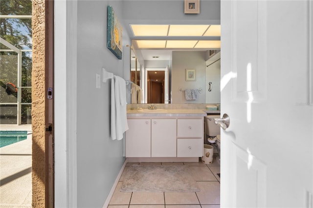 bathroom with vanity and tile patterned floors