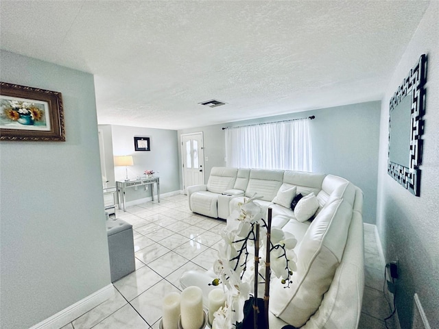 living room with a textured ceiling