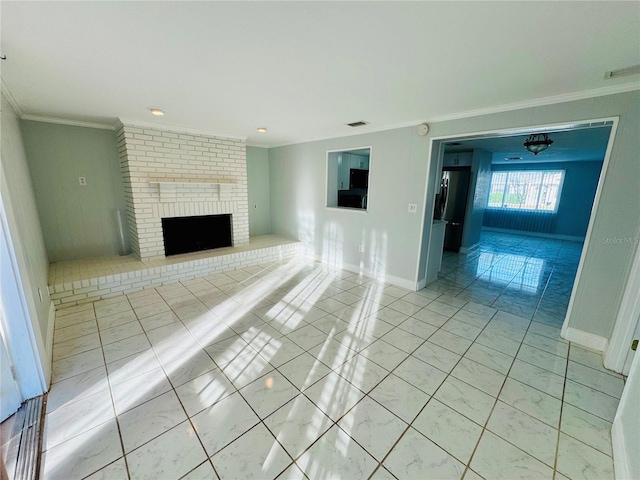 unfurnished living room with crown molding, a fireplace, and light tile patterned flooring