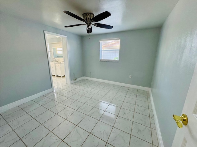 unfurnished room featuring ceiling fan