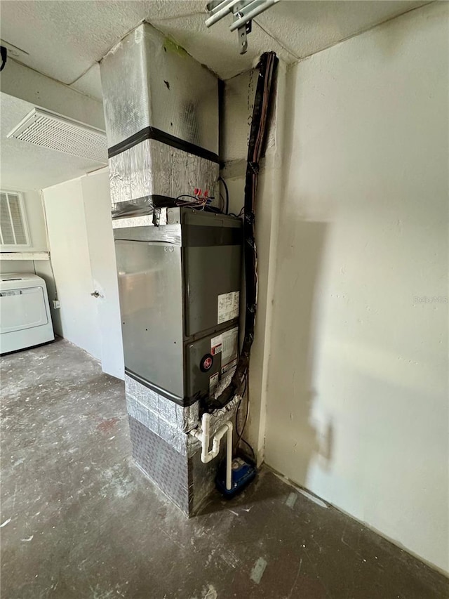 utility room with washer / clothes dryer