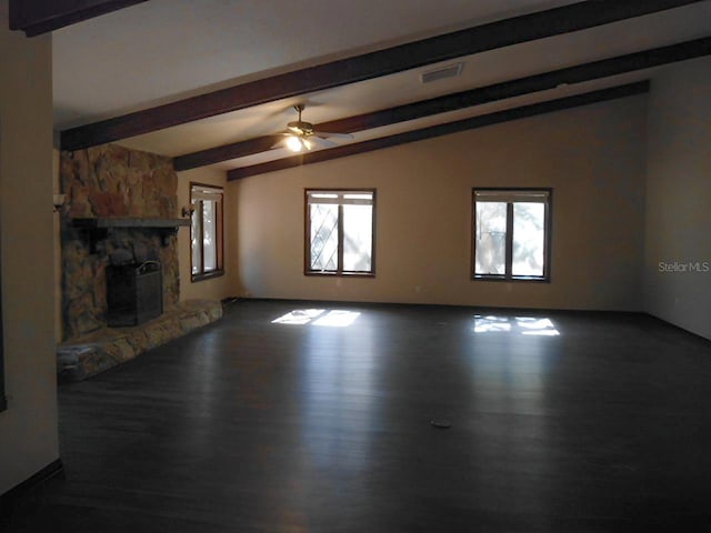 unfurnished living room with lofted ceiling with beams, dark hardwood / wood-style flooring, ceiling fan, and a fireplace