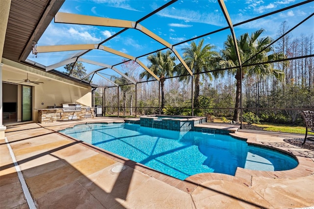 view of pool with an in ground hot tub, area for grilling, a patio, and glass enclosure