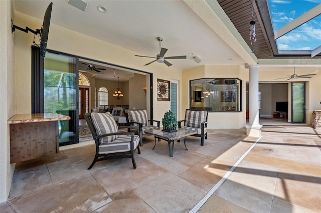 view of patio featuring outdoor lounge area and ceiling fan