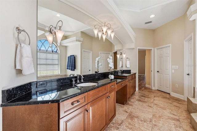 bathroom with vanity, tile patterned floors, and a chandelier