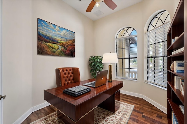 office area with ceiling fan and dark hardwood / wood-style flooring