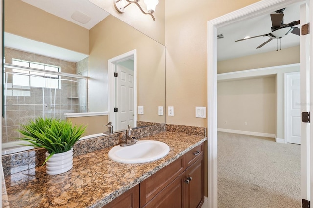20200 Lace Cascade Rd, Land O Lakes, FL 34637 - bathroom featuring vanity, ceiling fan, and tiled shower