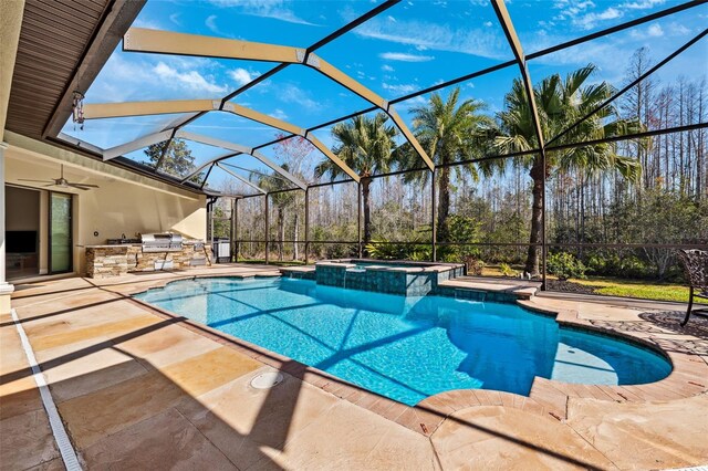 20200 Lace Cascade Rd, Land O Lakes, FL 34637 - view of pool with a pool with connected hot tub, a patio area, glass enclosure, and a ceiling fan