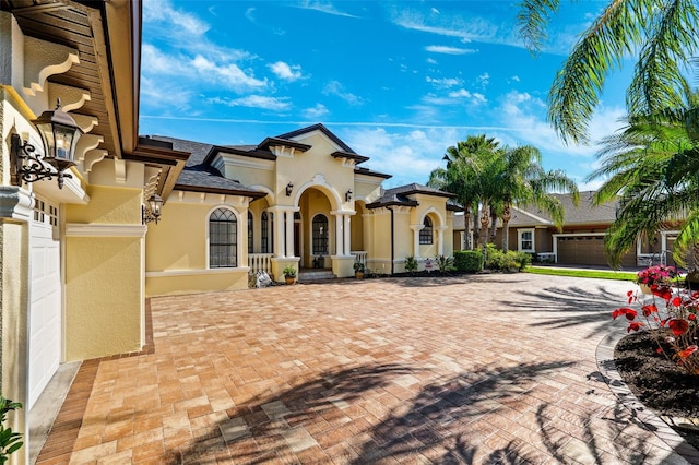 20200 Lace Cascade Rd, Land O Lakes, FL 34637 - view of front facade with stucco siding and driveway
