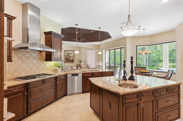 20200 Lace Cascade Rd, Land O Lakes, FL 34637 - kitchen with wall chimney range hood, appliances with stainless steel finishes, a sink, decorative backsplash, and recessed lighting