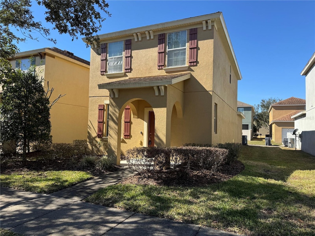 view of front of house with a front lawn