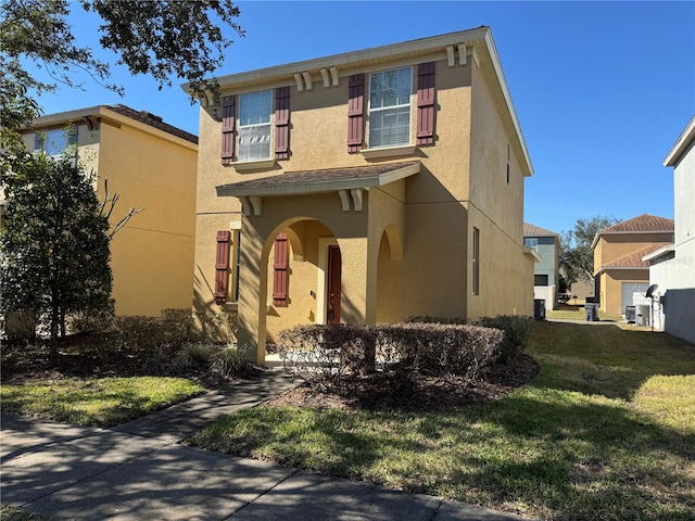 view of front of property with a front yard