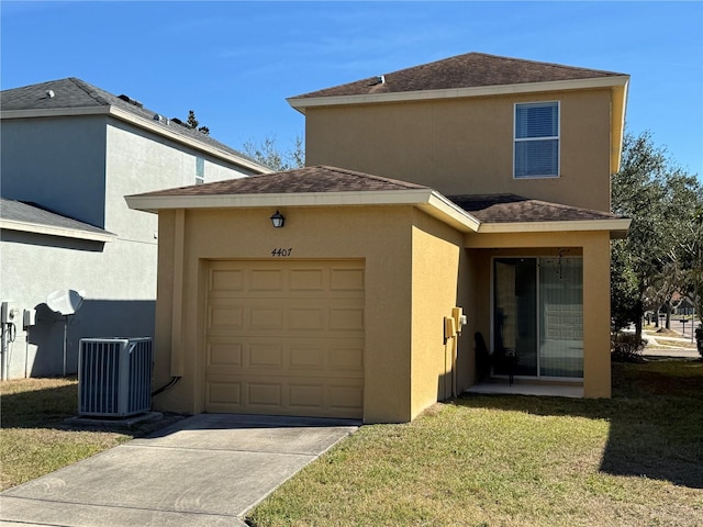 view of front of home with central AC, a garage, and a front lawn