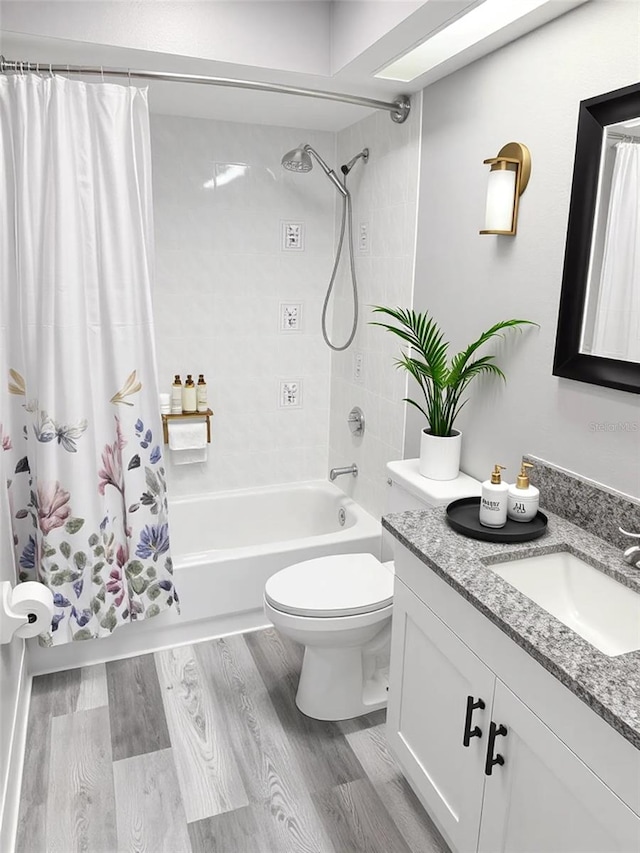 4218 San Rafael Ave, New Port Richey, FL 34655 - full bathroom with shower / bath combination with curtain, vanity, toilet, and wood finished floors