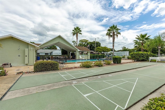 surrounding community featuring a pool