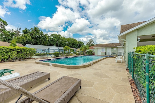 view of pool with a patio