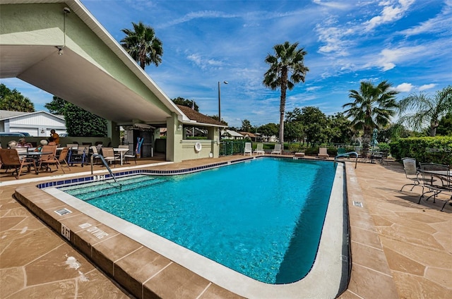 view of pool featuring a patio area