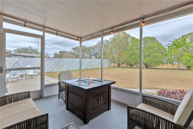 sunroom featuring a healthy amount of sunlight