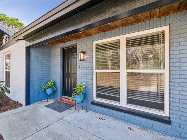 doorway to property with a patio