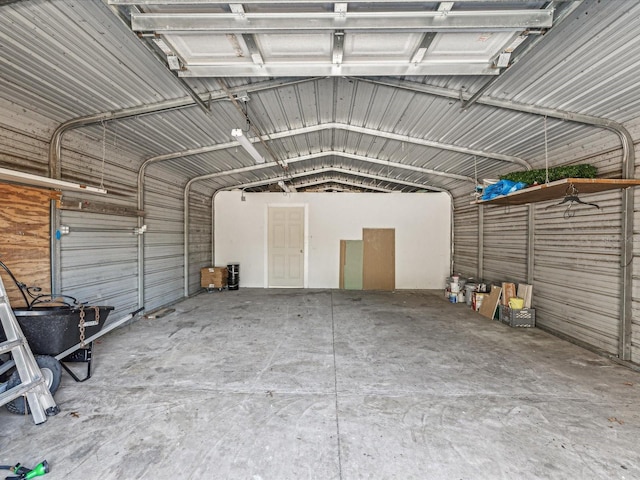 garage featuring a carport