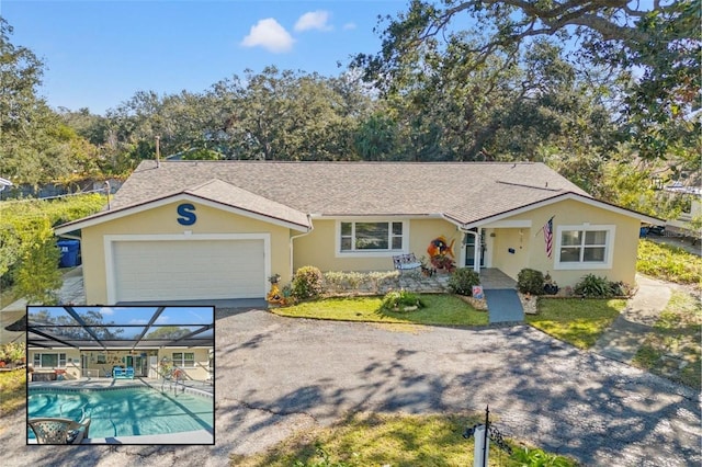 single story home featuring a garage, a front lawn, and glass enclosure