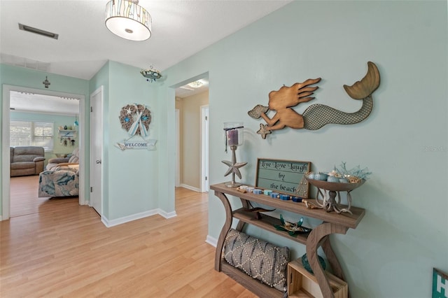 hall featuring light hardwood / wood-style floors