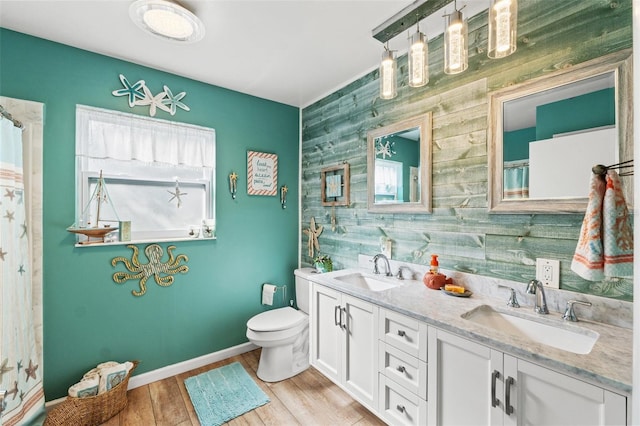 bathroom featuring a shower with curtain, vanity, toilet, and hardwood / wood-style floors