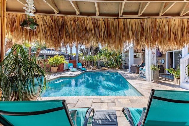 view of pool featuring a gazebo and a patio area