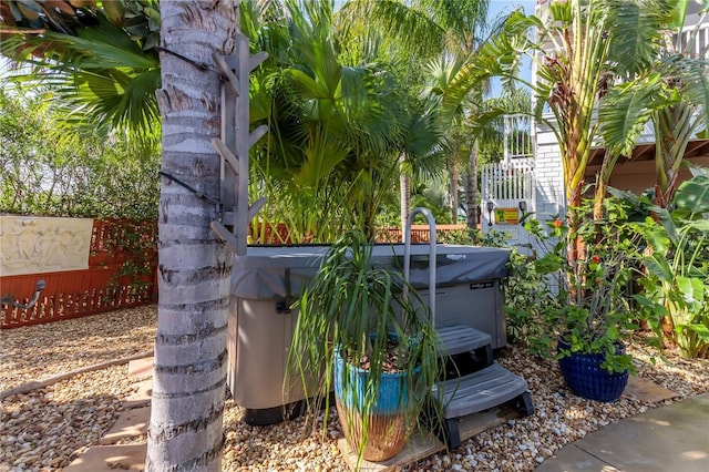 exterior details featuring a hot tub